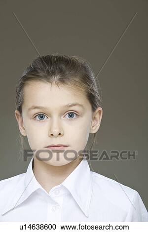 Stock Image - Studio portrait of girl . Fotosearch