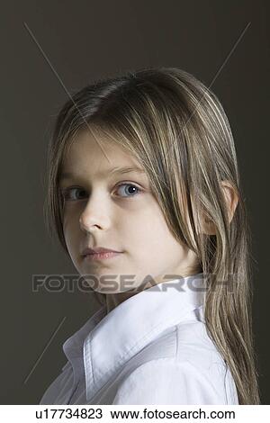 Stock Image - Studio portrait of girl . Fotosearch