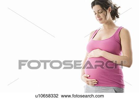 Studio portrait of pregnant woman View Large Photo Image Stock Image - Studio portrait of pregnant woman. Fotosearch