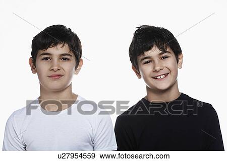 Studio portrait of twin boys (13-15) View Large Photo Image Stock Photo - Studio portrait of twin boys (13-15). Fotosearch