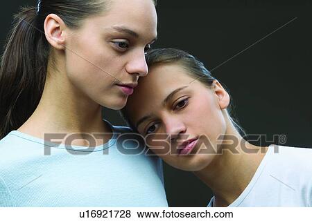 Studio portrait of two sisters View Large Photo Image Stock Photo - Studio portrait of two sisters. Fotosearch