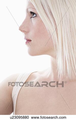 Studio shot of young woman close-up View Large Photo Image Stock Image - Studio shot of young woman close-up. Fotosearch