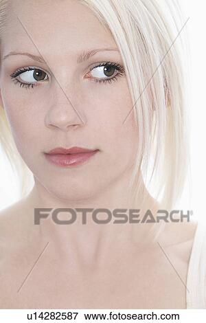 Stock Photo - Studio shot of young woman close-up. Fotosearch