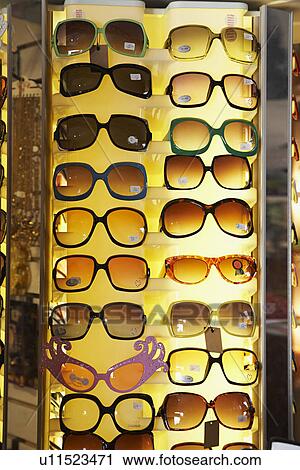 Stock Image - Sunglasses at Second Hand Store. Fotosearch