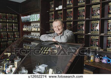 Tea Shop Owner in Store View Large Photo Image Picture - Tea Shop Owner in Store. Fotosearch