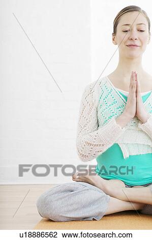 Teenage girl (16-17) performing yoga View Large Photo Image Stock Image - Teenage girl (16-17) performing yoga. Fotosearch