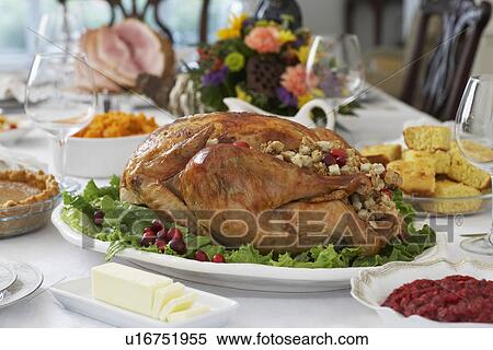 Thanksgivig dinner on table View Large Photo Image Stock Photography - Thanksgivig dinner on table. Fotosearch