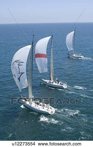 Picture - Three yachts compete in team sailing event California. Fotosearch