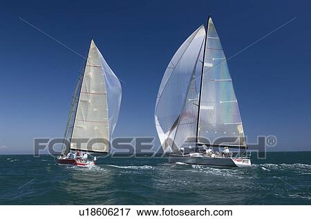 Stock Photo - Two yachts compete in team sailing event California. Fotosearch