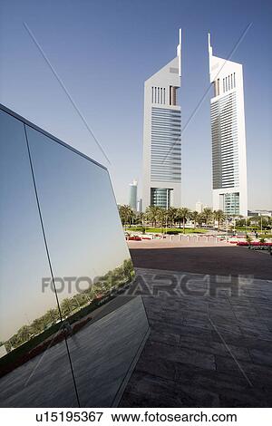 UAE Dubai reflection in a mirrored piece of artwork on display at the Dubai International Financi View Large Photo Image Stock Photo - UAE Dubai reflection in a mirrored piece of artwork on display at the Dubai International Financi. Fotosearch