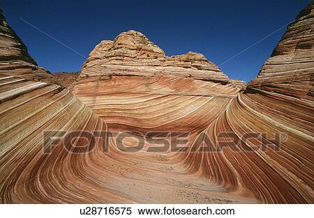 Stock Photography - USA Arizona Paria Canyon-Vermilion Cliffs Wilderness The Wave sandstone rock formation. Fotosearch