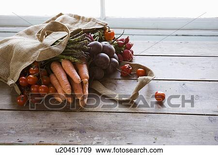 Stock Photo - Vegetables in bag. Fotosearch