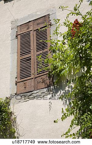 Stock Photo - Wall with shutters. Fotosearch