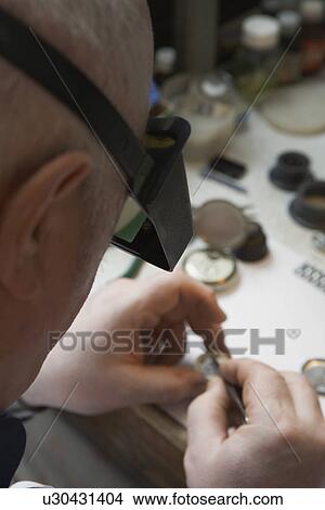 Picture - Watch Repairman at Work. Fotosearch
