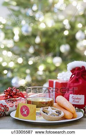 Whisky mince pies and carrots in front of christmas free View Large Photo Image Stock Photo - Whisky mince pies and carrots in front of christmas free. Fotosearch