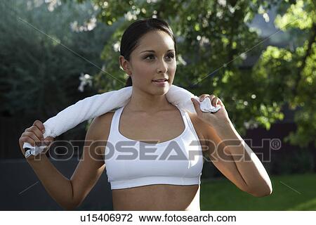 Woman exercising in park View Large Photo Image Stock Image - Woman exercising in park. Fotosearch