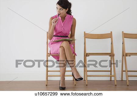 Stock Photo - Woman with pen. Fotosearch