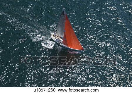 Yacht competes in team sailing event California aerial view View Large Photo Image Stock Image - Yacht competes in team sailing event California aerial view. Fotosearch