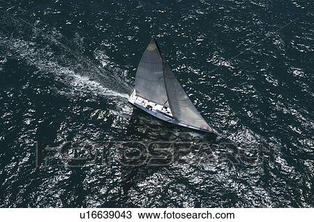 Yacht competes in team sailing event California aerial view View Large Photo Image Stock Image - Yacht competes in team sailing event California aerial view. Fotosearch