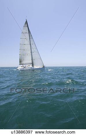 Stock Photo - Yacht competes in team sailing event California. Fotosearch