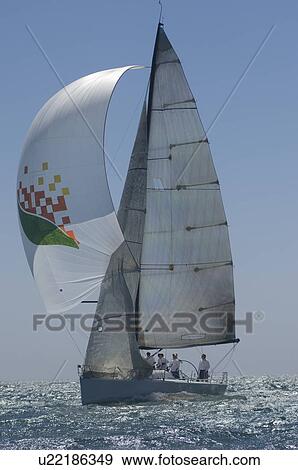 Stock Photo - Yacht competes in team sailing event California. Fotosearch