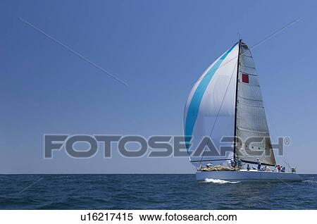Stock Photography - Yacht competes in team sailing event California. Fotosearch