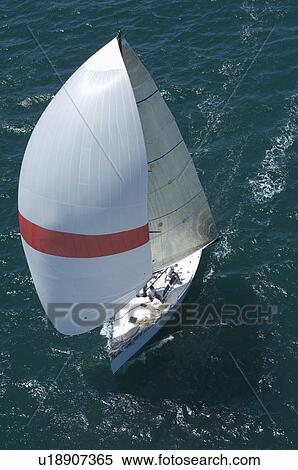 Stock Photography - Yacht competes in team sailing event California. Fotosearch