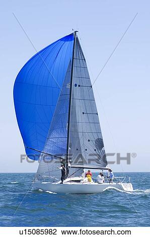 Yacht with blue sail competes in team sailing event California View Large Photo Image Stock Image - Yacht with blue sail competes in team sailing event California. Fotosearch