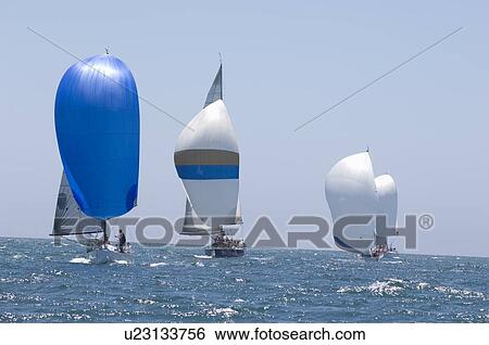 Stock Photograph - Yachts compete in team sailing event California. Fotosearch