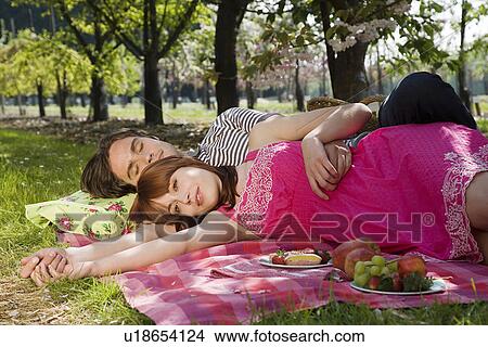 Young Couple Having a Picnic View Large Photo Image Picture - Young Couple Having a Picnic. Fotosearch