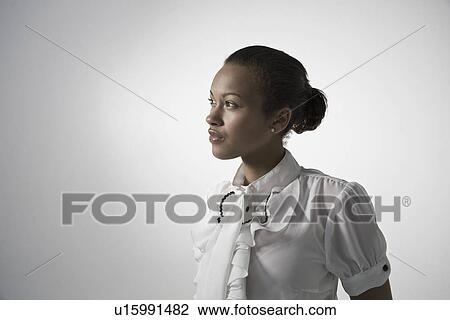 Young elegant woman studio shot View Large Photo Image Stock Image - Young elegant woman studio shot. Fotosearch
