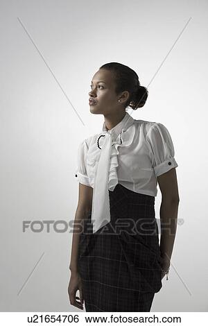 Stock Photograph - Young elegant woman studio shot. Fotosearch