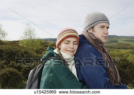 Young Hiking Couple Standing Together View Large Photo Image Stock Photo - Young Hiking Couple Standing Together. Fotosearch