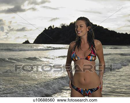 Stock Image - Young Woman at Beach. Fotosearch