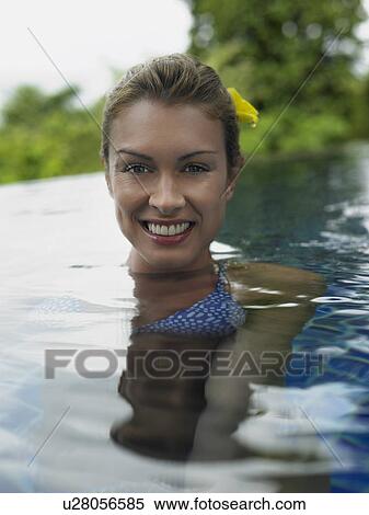 Young Woman in Swimming Pool View Large Photo Image Stock Photography - Young Woman in Swimming Pool. Fotosearch