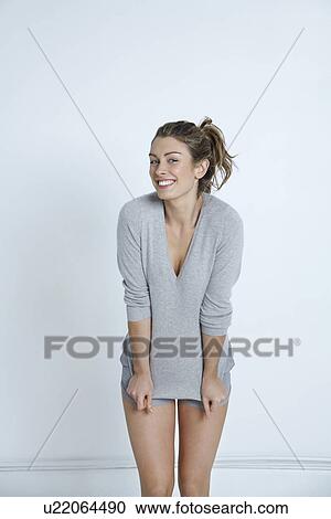 Stock Image - Young woman smiling portrait. Fotosearch