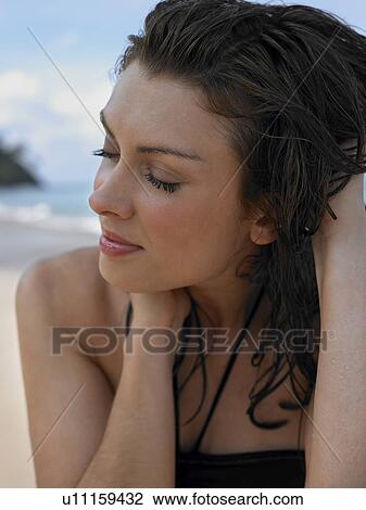 Young Woman with Hands in Hair View Large Photo Image Stock Image - Young Woman with Hands in Hair. Fotosearch