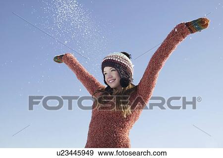 14 year old girl in winter clothing with arms raised View Large Photo Image Stock Photo - 14 year old girl in winter clothing with arms raised. Fotosearch