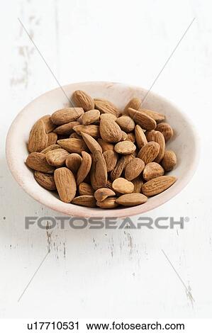 Stock Image - Almonds and cashews. Fotosearch