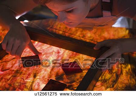 Stock Photography - Artist producing textiles close-up. Fotosearch