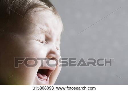 Stock Image - Baby girl crying. Fotosearch