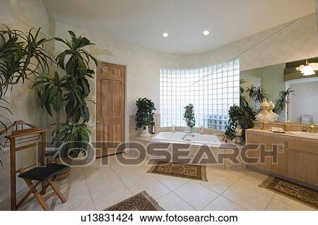 Picture - Bathroom with glass brick window and trouser press. Fotosearch