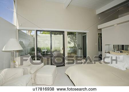 Bedroom in modern residence View Large Photo Image Stock Photo - Bedroom in modern residence. Fotosearch