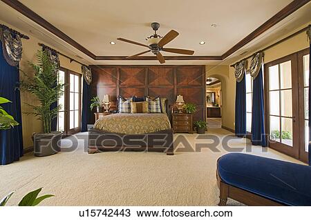 Bedroom interior with ceiling fan View Large Photo Image Stock Image - Bedroom interior with ceiling fan. Fotosearch