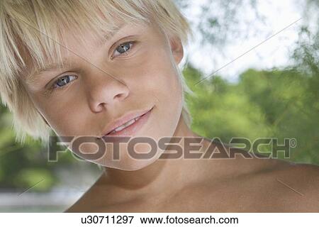 Blonde boy aged 12-13 years View Large Photo Image Stock Photo - Blonde boy aged 12-13 years. Fotosearch