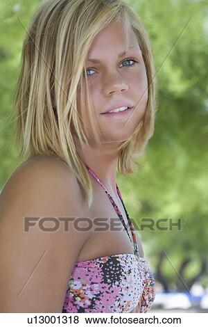 Blonde teenage girl in swimwear View Large Photo Image Stock Photo - Blonde teenage girl in swimwear. Fotosearch
