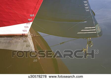 Boats reflecting in water View Large Photo Image Stock Photo - Boats reflecting in water. Fotosearch