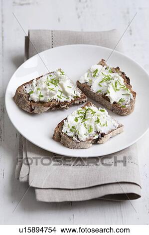 Picture - Bread and cream cheese. Fotosearch
