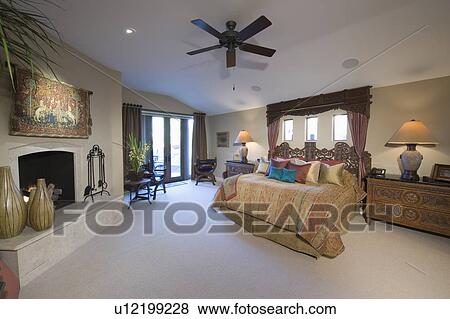 Cailing fan is spacious Palm Springs bedroom View Large Photo Image Stock Photo - Cailing fan is spacious Palm Springs bedroom. Fotosearch
