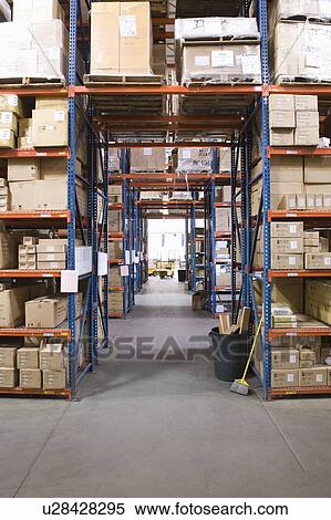 Cardboard boxes on shelves in distribution warehouse View Large Photo Image Stock Photography - Cardboard boxes on shelves in distribution warehouse. Fotosearch